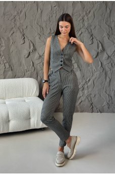 Элегантный женский жилет в черную клетку